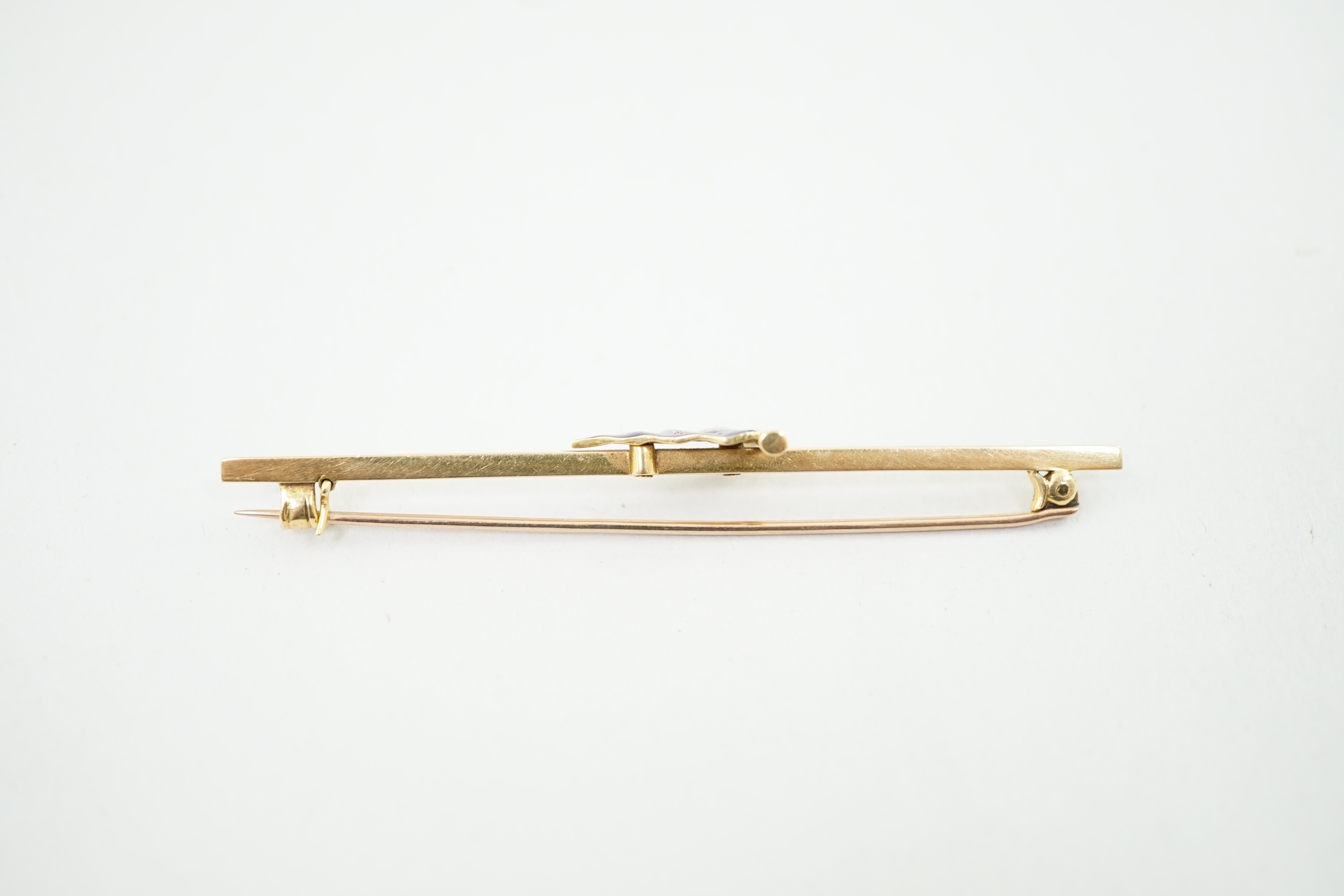 An early 20th century Benzies of Cowes 18ct gold and enamel ensign bar brooch